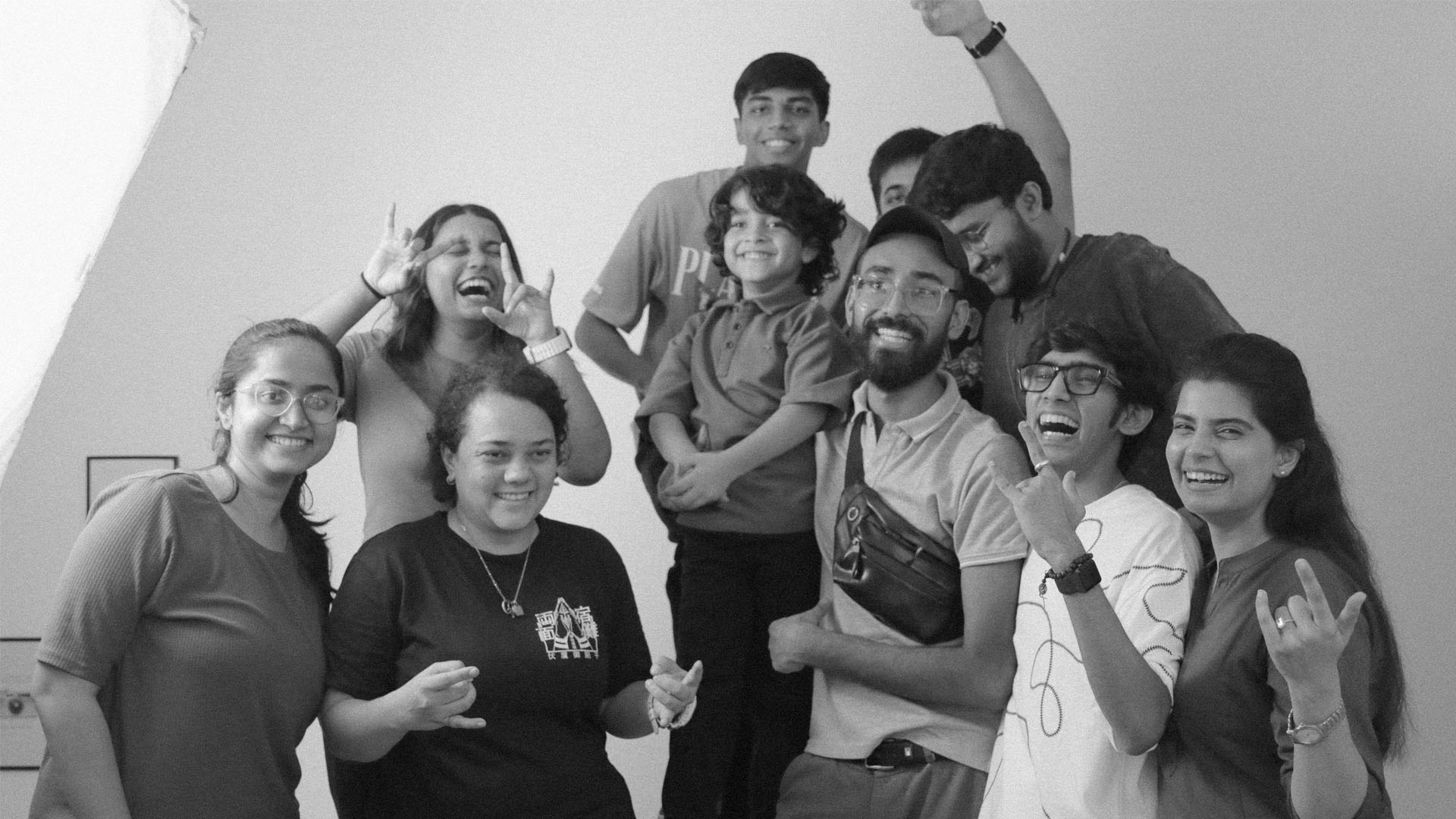 The cast and crew sharing a happy moment on set